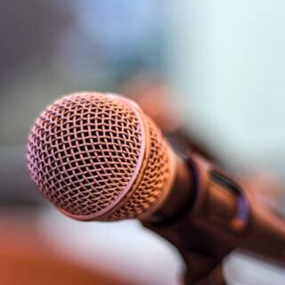 microphone to illustrate forthcoming webinar event
