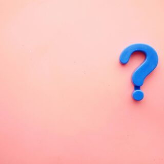 blue question mark on pink background